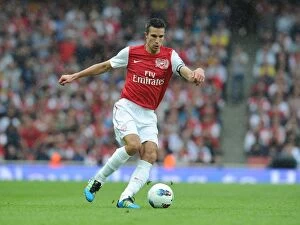 Images Dated 20th August 2011: Arsenal vs. Liverpool: Clash of Titans - Nasri and van Persie in Premier League Action