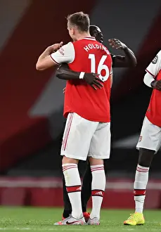 Arsenal vs. Liverpool: Empty-stadium Hug as Premier League Resumes Amidst Coronavirus Pandemic