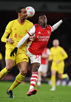 Arsenal V Liverpool 2021-22 Prints: Arsenal vs. Liverpool: Intense Clash Between Eddie Nketiah and Joel Matip in the Premier League