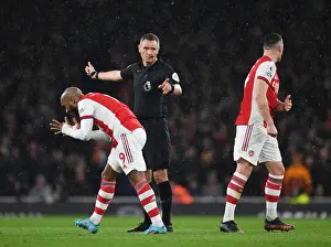 Arsenal vs. Liverpool: Intense Moment Between Lacazette and Xhaka Amidst Premier League Controversy