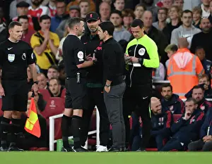 Arsenal vs. Liverpool: Mikel Arteta and Jurgen Klopp Clash with Referee Michael Oliver in the Premier League
