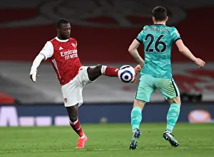 Arsenal vs. Liverpool: Pepe vs. Robertson - Intense Battle in the Premier League