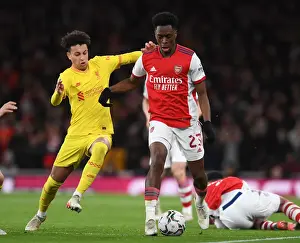 Arsenal V Liverpool Carabao Cup 2021-22 Prints: Arsenal vs Liverpool Showdown: Lokonga vs Gordon Battle for Carabao Cup Semi-Final Victory