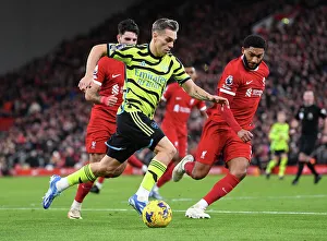 Liverpool V Arsenal 2023-24 Prints: Arsenal vs. Liverpool: Trossard vs. Gomez - Premier League Clash at Anfield (2023-24)