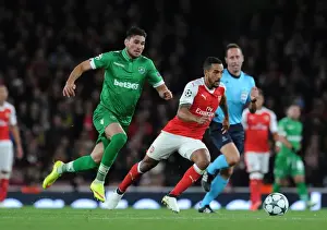 Arsenal V PFC Ludogorets Razgrad 2016-17 Prints: Arsenal vs Ludogorets: Theo Walcott Clashes with Jose Luis Palomino in the 2016-17 UEFA Champions League