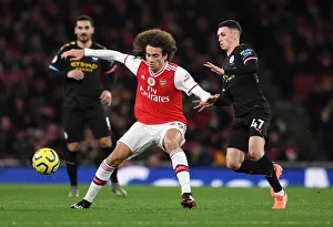 Arsenal V Manchester City 2019-20 Prints: Arsenal vs Manchester City: Matteo Guendouzi vs Phil Foden Battle at Emirates Stadium (Premier League 2019-20)