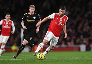 Arsenal V Manchester City 2019-20 Prints: Arsenal vs Manchester City: Sokratis vs De Bruyne - Premier League Clash at Emirates Stadium (December 2019)