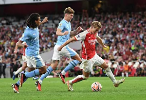 Arsenal vs Manchester City: Martin Odegaard Faces Off Against Stones and Ake in Intense Premier League Clash (2023-24)