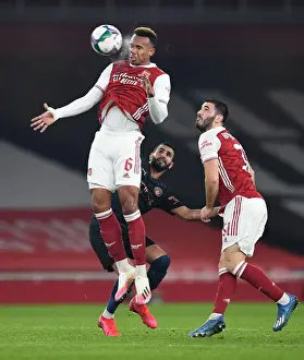 Arsenal vs Manchester City: Carabao Cup Showdown - Gabriel Magalhaes Defends Against Mahrez