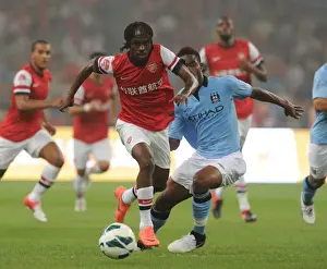 Arsenal V Man City - Pre Season 2012-13 Prints: Arsenal vs Manchester City: Gervinho Breaks Past Razak in Beijing Pre-Season Clash, 2012