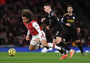 Arsenal V Manchester City 2019-20 Prints: Arsenal vs Manchester City: Guendouzi Tripped by Foden in Intense Premier League Clash (2019-20)