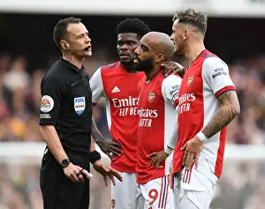 Arsenal vs Manchester City: Intense Discussion Between Players and Referee
