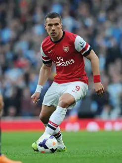 Arsenal vs Manchester City: Lukas Podolski in Action at the Emirates Stadium, Premier League 2013/14
