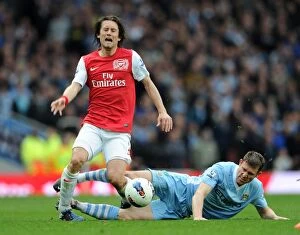 Images Dated 8th April 2012: Arsenal vs Manchester City: Rosicky Fouls Milner in Intense Premier League Clash (2011-12)