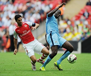 Arsenal V Manchester City - FA Community Shield 2014/15 Prints: Arsenal vs Manchester City Showdown: Arteta vs Toure Battle at the FA Community Shield
