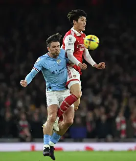 Arsenal V Manchester City 2022-23 Prints: Arsenal vs Manchester City: Tomiyasu vs Grealish Clash in Premier League Showdown