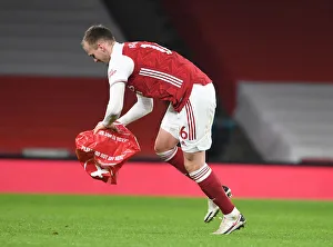 Arsenal vs Manchester United: Rob Holding Clears Object from Empty Emirates Stadium during Premier League Match Amid Coronavirus Restrictions (2020-21)