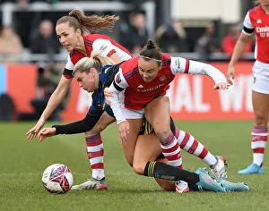 Arsenal vs Manchester United: Intense Battle in FA WSL Match - Caitlin Foord and Lia Walti vs Alessia Russo