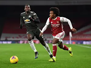 Arsenal vs Manchester United: A Battle at Emirates Stadium Amidst Pandemic Restrictions (2020-21)