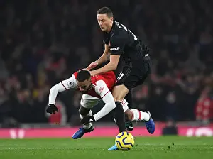 Arsenal V Manchester United 2019-20 Prints: Arsenal vs Manchester United: Lacazette Fouls by Matic in Intense Premier League Clash (2019-20)