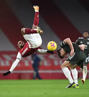 Arsenal vs Manchester United: Lacazette Tangles with Maguire in Empty Emirates Stadium