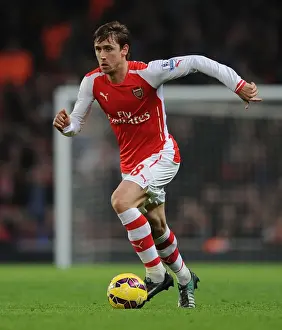 Arsenal V Manchester United 2014-15 Prints: Arsenal vs Manchester United: Nacho Monreal in Action at the Emirates Stadium (2014-15)