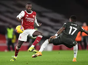 Arsenal vs Manchester United: Pepe Tackles Pressure Amid Empty Emirates Stadium (Premier League 2020-21)