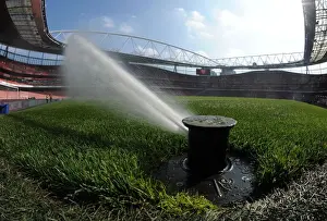 Arsenal V Manchester United 2015/16 Prints: Arsenal vs Manchester United: Premier League Showdown (2015/16) - The Pitched Battle: Arsenal's Soaking Surprise