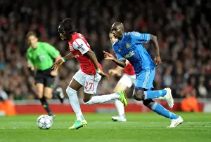 Arsenal V Marseille 2011-12 Prints: Arsenal vs Marseille: 0-0 Stalemate in Champions League Group F (Gervinho vs Alou Diarra)