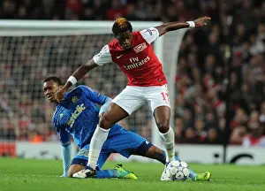 Arsenal V Marseille 2011-12 Prints: Arsenal vs. Marseille: Clash between Alex Song and Jordan Ayew in the 2011-12 UEFA Champions League