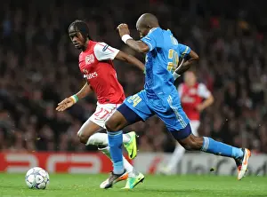 Arsenal vs Marseille: Intense Battle Between Gervinho and Rod Fanni in the 2011-12 UEFA Champions League