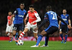 Images Dated 1st February 2009: Arsenal vs Monaco: Alexis Sanchez Faces Off Against Kondogbia in Champions League Showdown