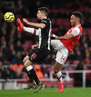 Arsenal V Newcastle United 2019-20 Prints: Arsenal vs Newcastle: Aubameyang Clashes with Fernandez in Premier League Showdown