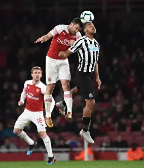 Arsenal vs Newcastle: Intense Battle between Rondon and Sokratis
