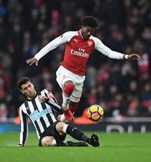 Images Dated 16th December 2017: Arsenal vs Newcastle United: Ainsley Maitland-Niles vs Mikel Merino Clash in the Premier League