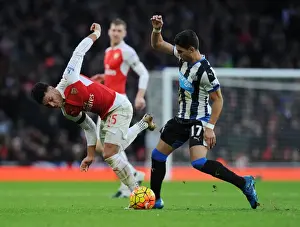 Arsenal vs Newcastle United: A Battle between Oxlade-Chamberlain and Perez
