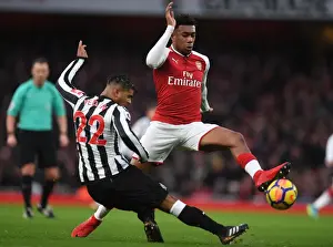 Arsenal V Newcastle United 2017-18 Prints: Arsenal vs Newcastle United: Iwobi Faces Off Against Yedlin in Premier League Clash