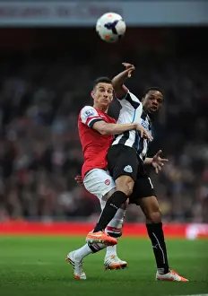 Arsenal V Newcastle United 2013/14 Prints: Arsenal vs Newcastle United: Koscielny vs Remy in Intense Battle