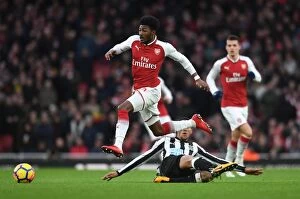 Images Dated 16th December 2017: Arsenal vs Newcastle United: A Midfield Showdown - Maitland-Niles vs Hayden