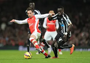 Arsenal V Newcastle United 2014/15 Prints: Arsenal vs Newcastle United: Santi Cazorla vs Cheick Tiote - Premier League Showdown