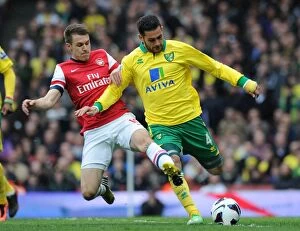 Images Dated 13th April 2013: Arsenal vs. Norwich City: Battle Between Aaron Ramsey and Bradley Johnson