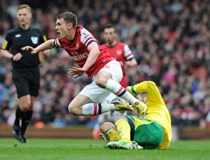 Images Dated 13th April 2013: Arsenal vs. Norwich City: Battle between Ramsey and Johnson at the Emirates