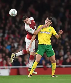 Arsenal V Norwich - Carabo Cup 4th Round 2017-18 Prints: Arsenal vs Norwich: Debuchy Heads Away from Oliveira in Carabao Cup Clash