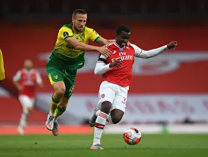 Arsenal V Norwich City 2019-20 Prints: Arsenal vs Norwich: Nketiah Fouls Marco Stiepermann in Premier League Clash at Emirates Stadium