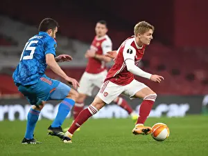Arsenal vs Olympiacos: Clash of Martin Odegaard and Sokratis in Empty Europa League Match, London, 2021