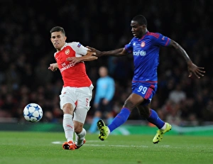 Arsenal V Olympiacos 2015/16 Prints: Arsenal vs. Olympiacos: Gabriel vs. Ideye - Champions League Clash