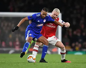 Arsenal vs Olympiacos: Mustafi Clashes with El Arabi in Europa League Showdown