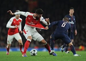 Images Dated 23rd November 2016: Arsenal vs. Paris Saint-Germain: Olivier Giroud vs. Marco Verratti Clash in 2016-17 Champions League