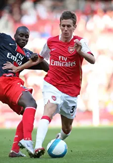 Arsenal V Paris Saint Germain 2007-08 Prints: Arsenal vs Paris Saint-Germain: Mark Randall and Granddi Ngoyi Clash in the Emirates Cup