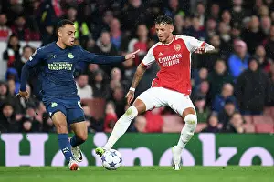 Arsenal V PSV Eindhoven 2023-24 Prints: Arsenal vs PSV Eindhoven: Battle for Possession in the UEFA Champions League Group Stage